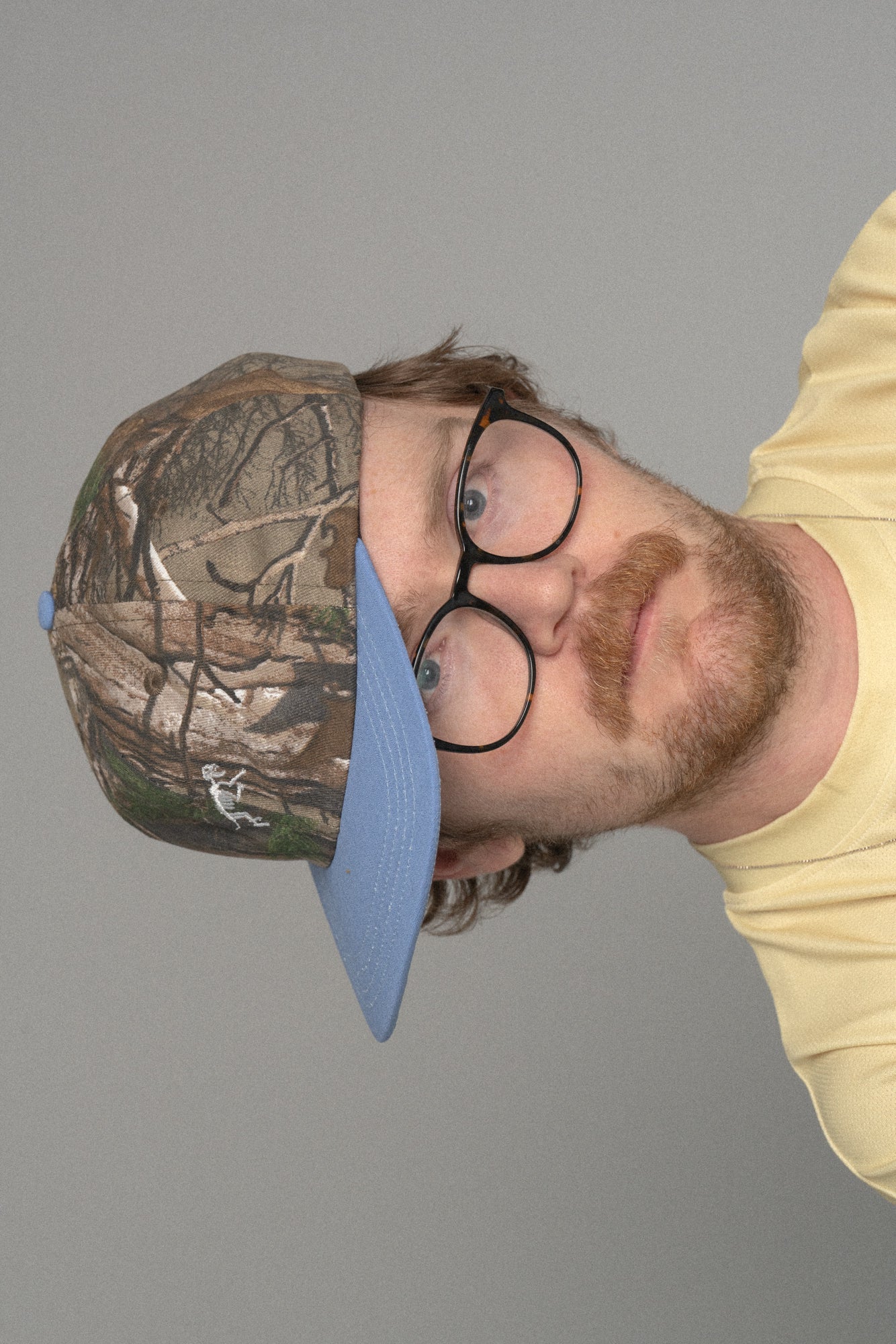 Mini Boney Ball Cap Real Tree Camo/Blue Brim